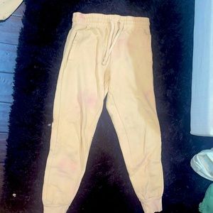 Orange and peach lightly tie dyed sweatpants